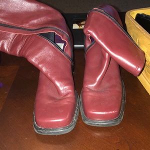 Burgundy boots.